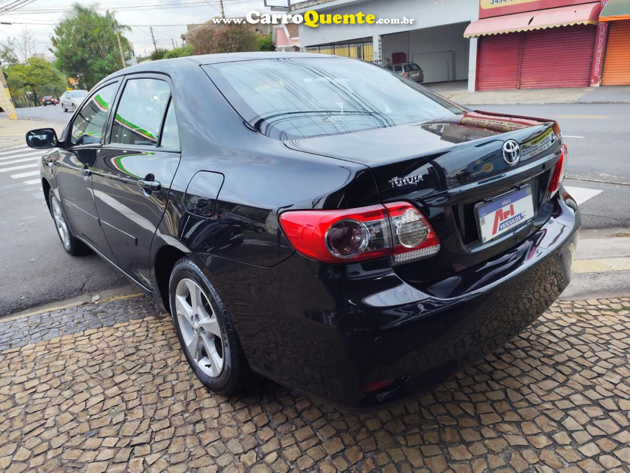 TOYOTA   COROLLA GLI 1.8 FLEX 16V  AUT.   PRETO 2013 1.8 FLEX - Loja