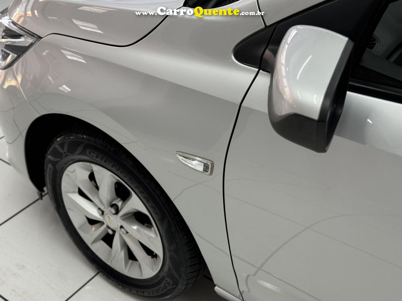 CHEVROLET   ONIX HATCH 1.0 12V FLEX 5P MEC.   PRATA 2023 1.0 FLEX - Loja