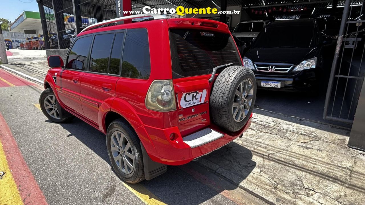 MITSUBISHI   PAJERO TR4 2.0 FLEX 16V 4X2 AUT.   VERMELHO 2013 2.0 FLEX - Loja