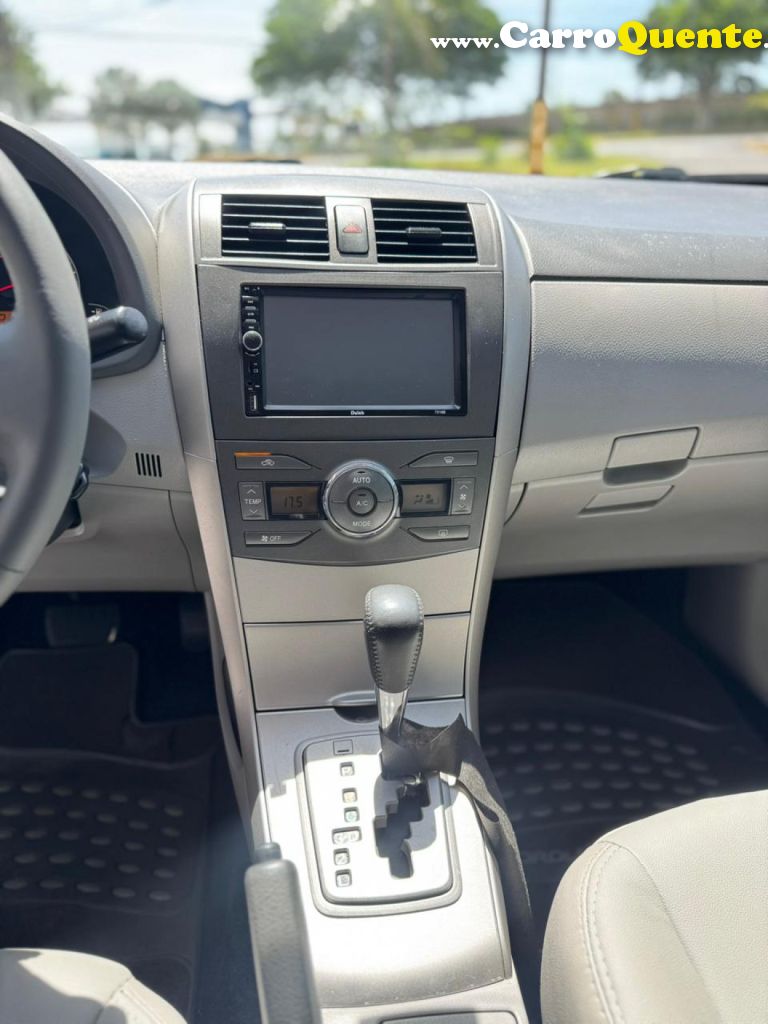 TOYOTA   COROLLA XEI 1.81.8 FLEX 16V AUT.   PRETO 2010 1.8 FLEX - Loja
