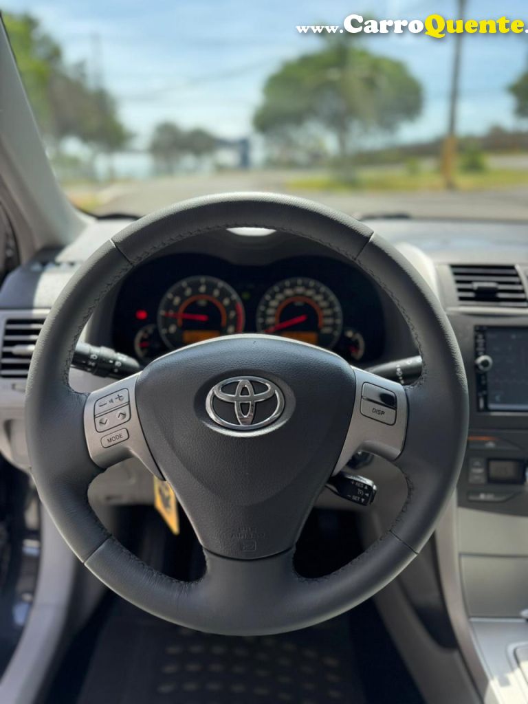 TOYOTA   COROLLA XEI 1.81.8 FLEX 16V AUT.   PRETO 2010 1.8 FLEX - Loja