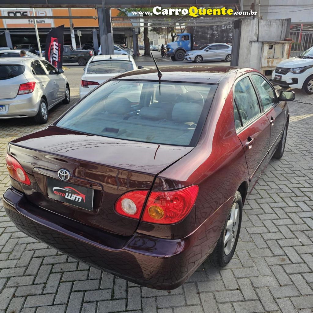 TOYOTA   COROLLA SE-G 1.81.8 FLEX 16V AUT.   VERMELHO 2004 1.8 FLEX - Loja