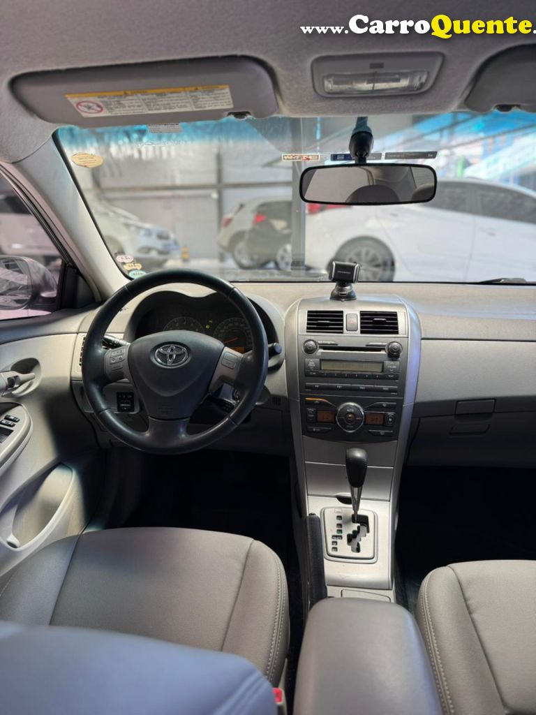 TOYOTA   COROLLA XEI 1.81.8 FLEX 16V AUT.   PRETO 2009 1.8 FLEX - Loja