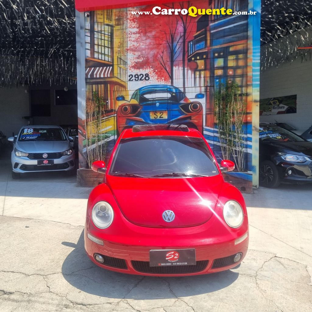 VOLKSWAGEN   NEW BEETLE 2.0 MI MEC.AUT.   VERMELHO 2007 2.0 GASOLINA - Loja