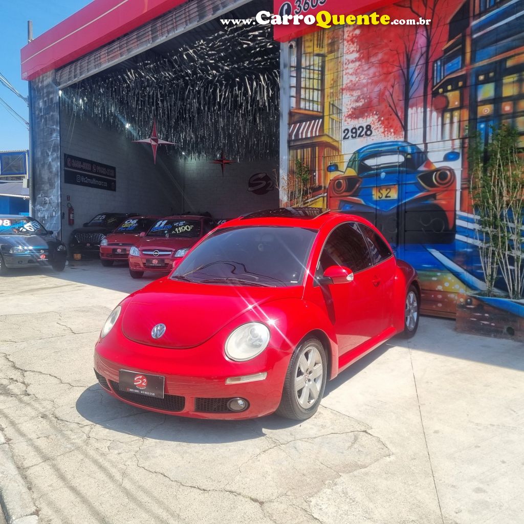 VOLKSWAGEN   NEW BEETLE 2.0 MI MEC.AUT.   VERMELHO 2007 2.0 GASOLINA - Loja