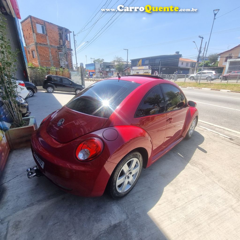 VOLKSWAGEN   NEW BEETLE 2.0 MI MEC.AUT.   VERMELHO 2007 2.0 GASOLINA - Loja