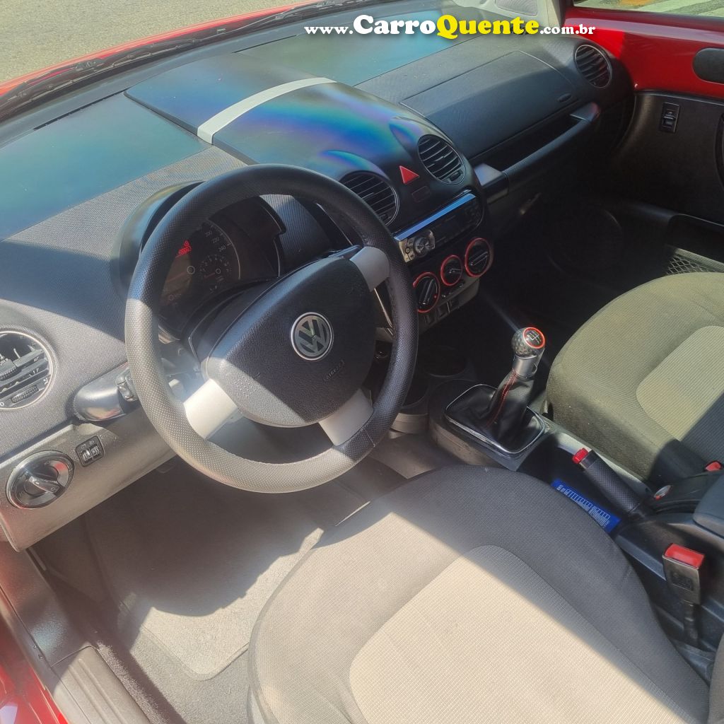 VOLKSWAGEN   NEW BEETLE 2.0 MI MEC.AUT.   VERMELHO 2007 2.0 GASOLINA - Loja