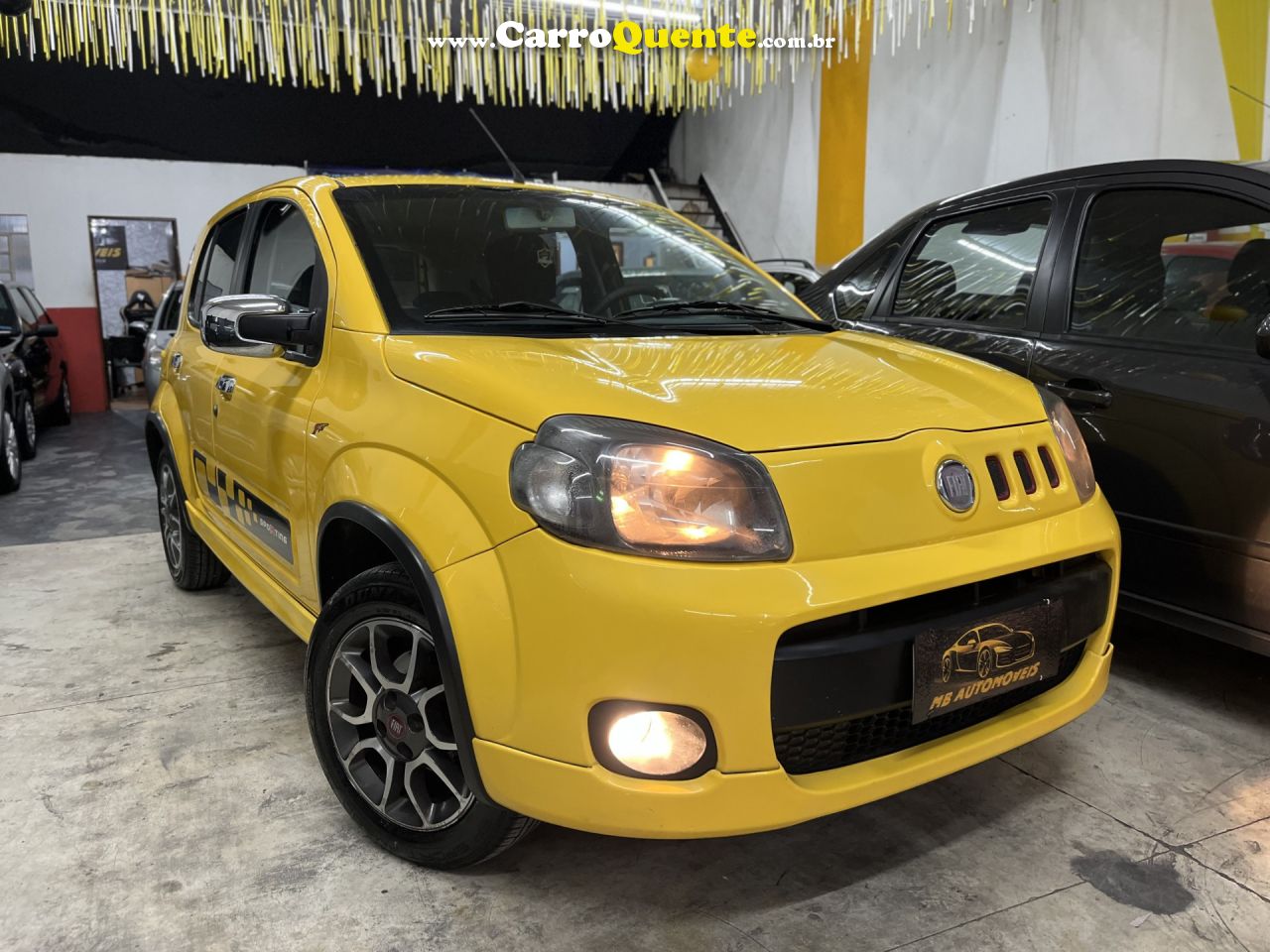 FIAT   UNO SPORTING 1.4 EVO FIRE FLEX 8V 4P   AMARELO 2011 1.4 FLEX - Loja