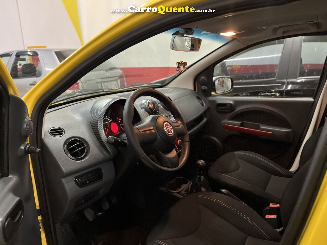 FIAT   UNO SPORTING 1.4 EVO FIRE FLEX 8V 4P   AMARELO 2011 1.4 FLEX - Loja