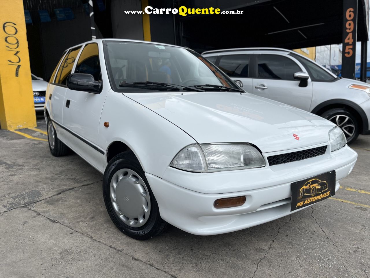 SUZUKI   SWIFT HATCH 1.0 3P E 5P   BRANCO 1998 1.0 GASOLINA - Loja