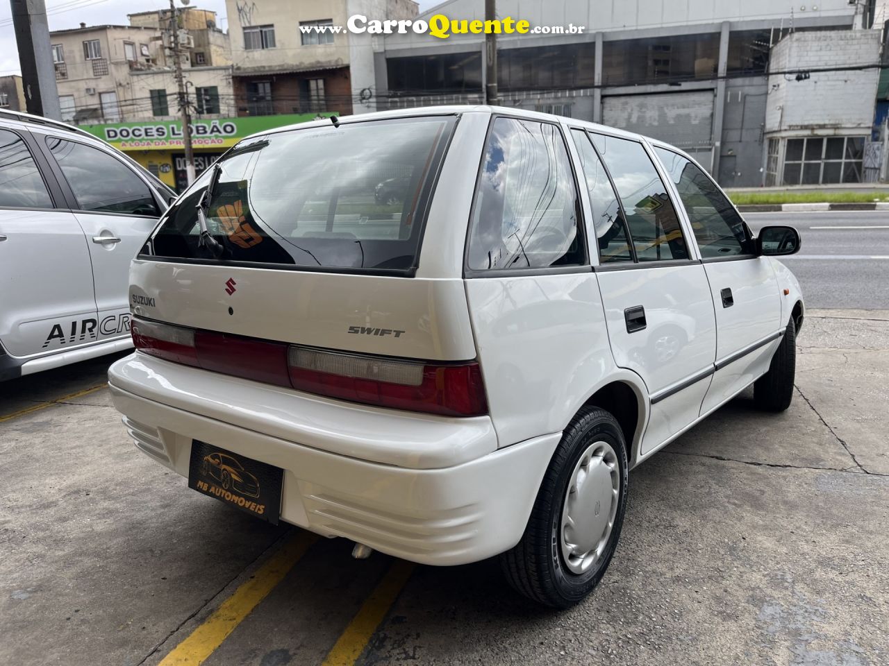 SUZUKI   SWIFT HATCH 1.0 3P E 5P   BRANCO 1998 1.0 GASOLINA - Loja