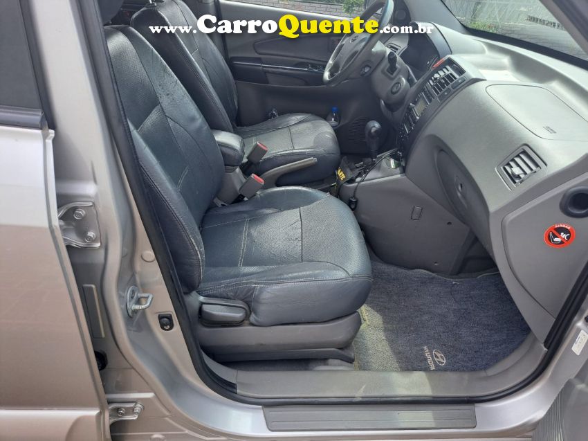 Hyundai TUCSON 2.0 MPFI GL 16V 142CV 2WD GASOLINA 4P AUTOMÁTICO - Loja