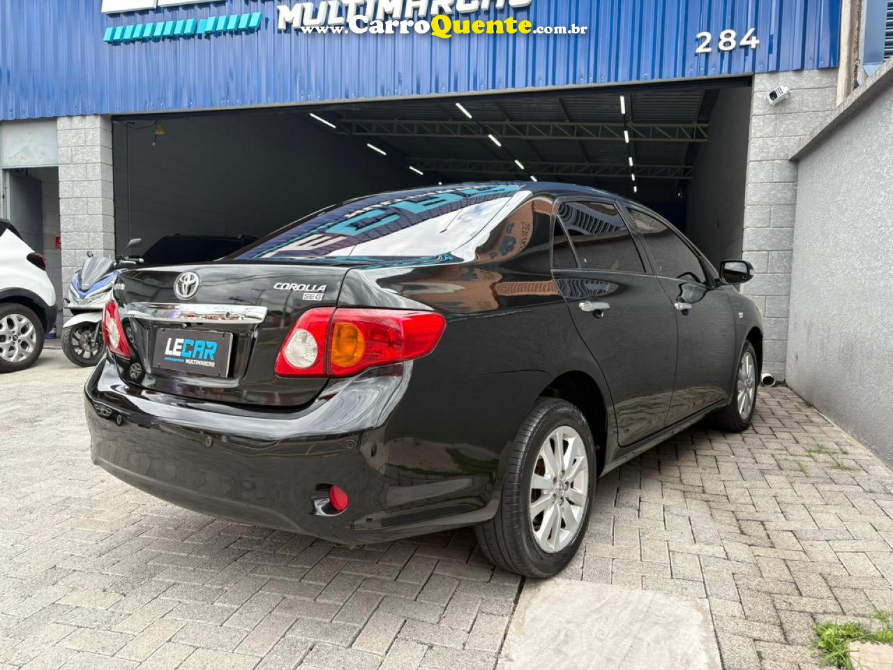 TOYOTA   COROLLA SE-G 1.81.8 FLEX 16V AUT.   PRETO 2010 1.8 FLEX - Loja