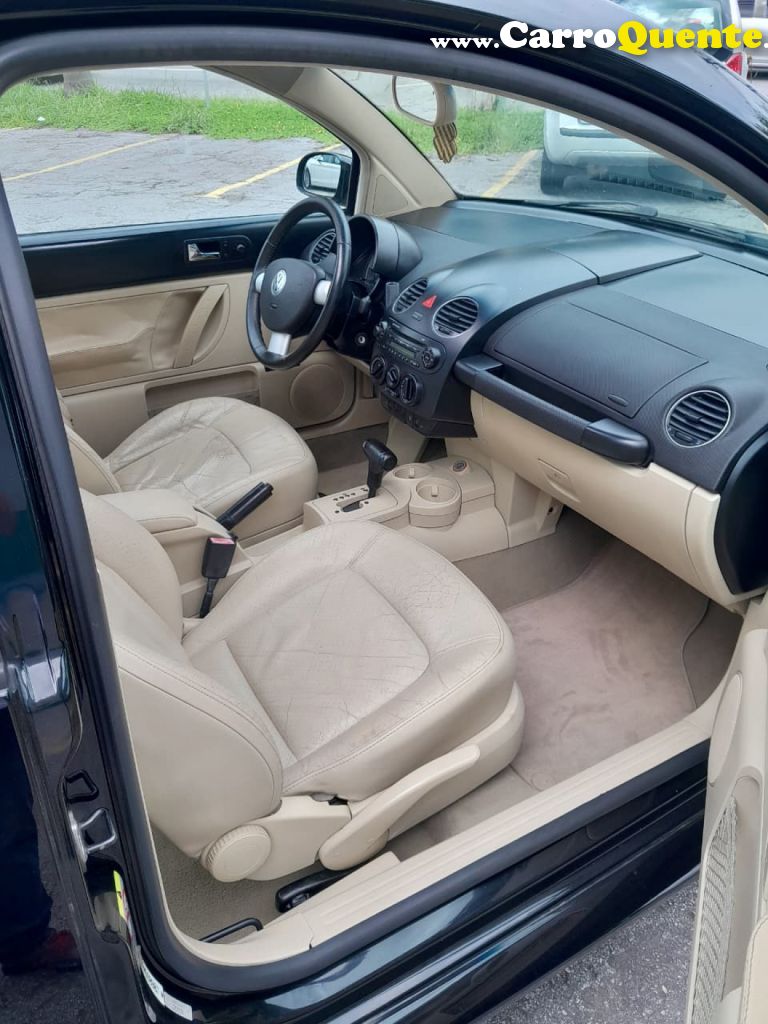VOLKSWAGEN   NEW BEETLE 2.0 MI MEC.AUT.   PRETO 2010 2.0 GASOLINA - Loja