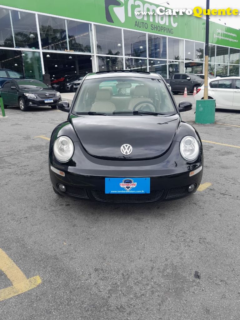 VOLKSWAGEN   NEW BEETLE 2.0 MI MEC.AUT.   PRETO 2010 2.0 GASOLINA - Loja