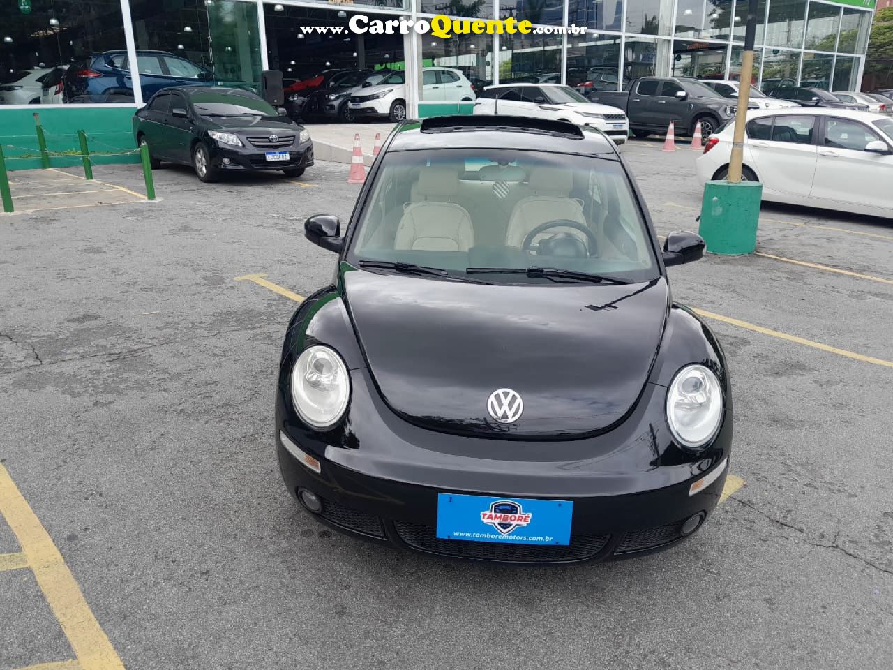 VOLKSWAGEN   NEW BEETLE 2.0 MI MEC.AUT.   PRETO 2010 2.0 GASOLINA - Loja