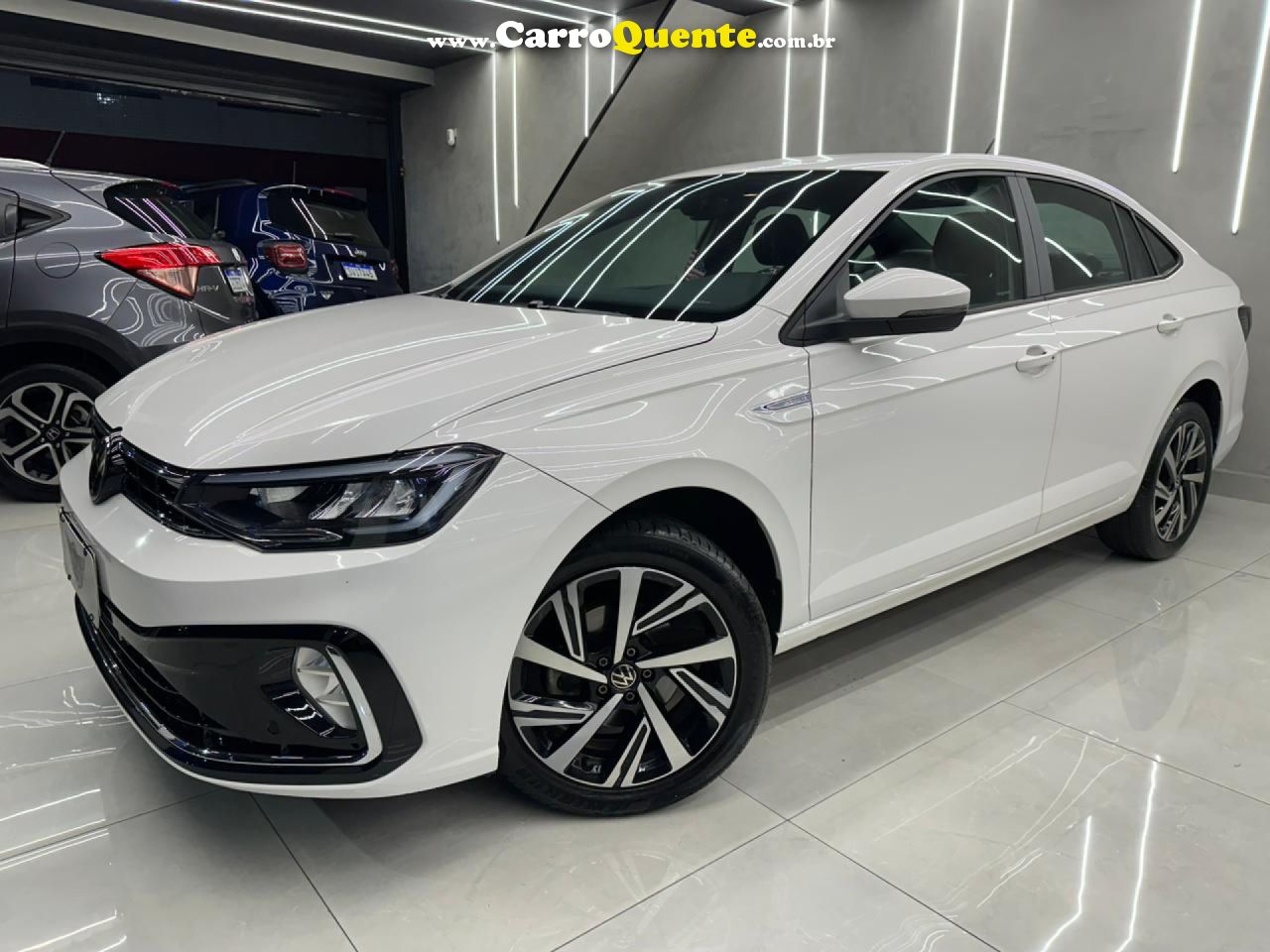 VOLKSWAGEN   VIRTUS HIGHLINE 200 TSI 1.0 FLEX 12V AUT   BRANCO 2024 1.0 FLEX - Loja