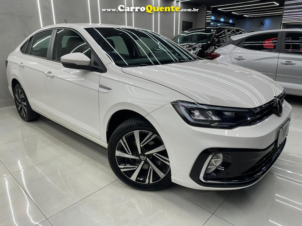 VOLKSWAGEN   VIRTUS HIGHLINE 200 TSI 1.0 FLEX 12V AUT   BRANCO 2024 1.0 FLEX - Loja