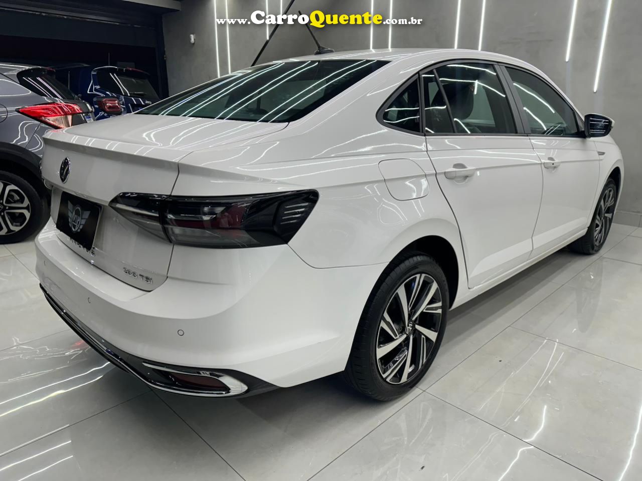 VOLKSWAGEN   VIRTUS HIGHLINE 200 TSI 1.0 FLEX 12V AUT   BRANCO 2024 1.0 FLEX - Loja