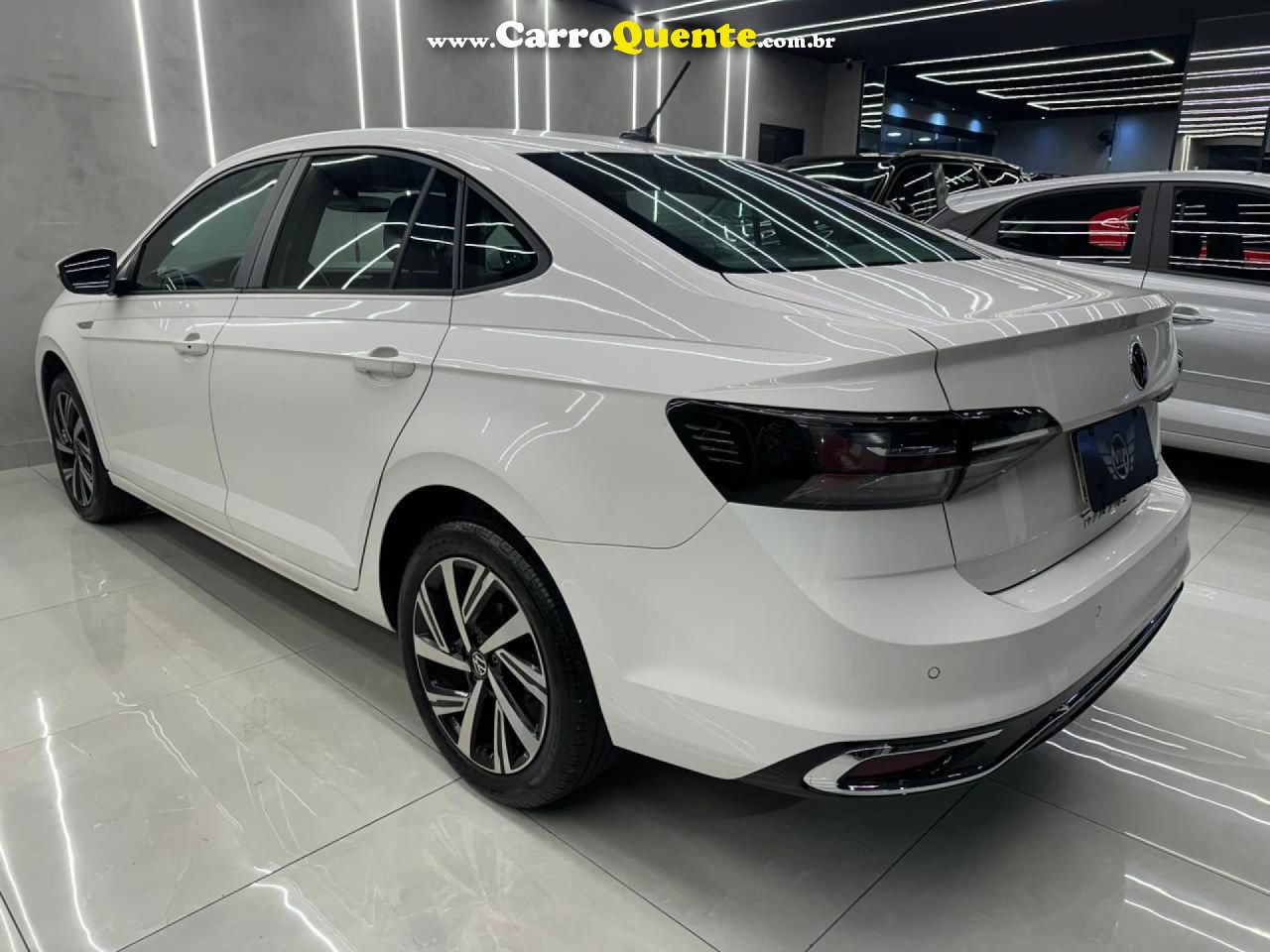 VOLKSWAGEN   VIRTUS HIGHLINE 200 TSI 1.0 FLEX 12V AUT   BRANCO 2024 1.0 FLEX - Loja