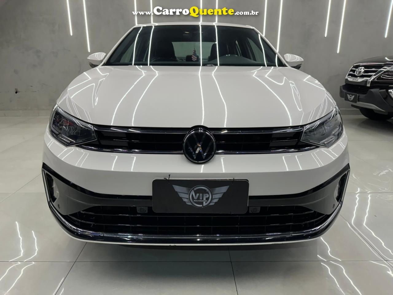 VOLKSWAGEN   VIRTUS HIGHLINE 200 TSI 1.0 FLEX 12V AUT   BRANCO 2024 1.0 FLEX - Loja