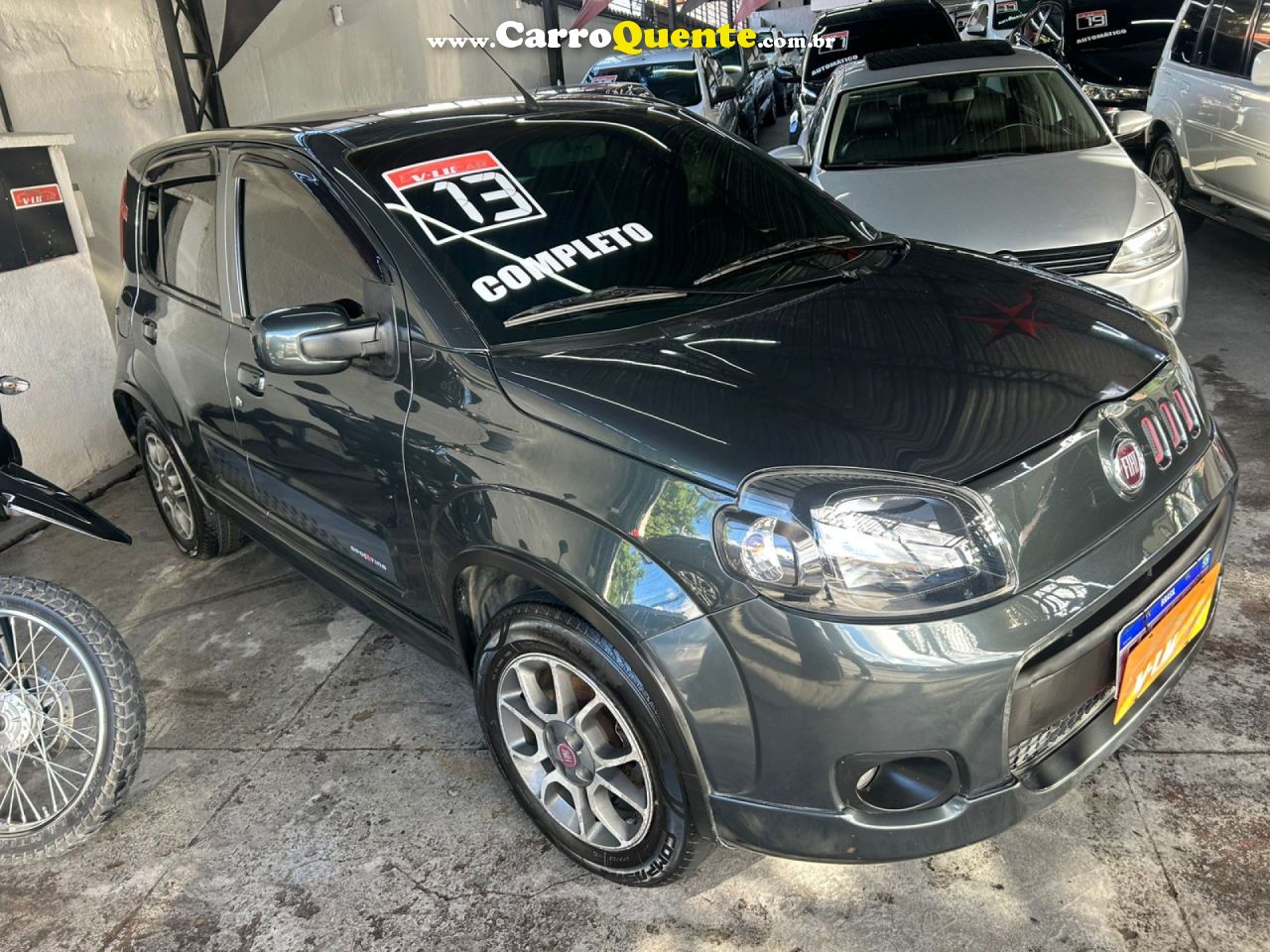 FIAT   UNO SPORTING 1.4 EVO FIRE FLEX 8V 4P   CINZA 2013 1.4 FLEX - Loja