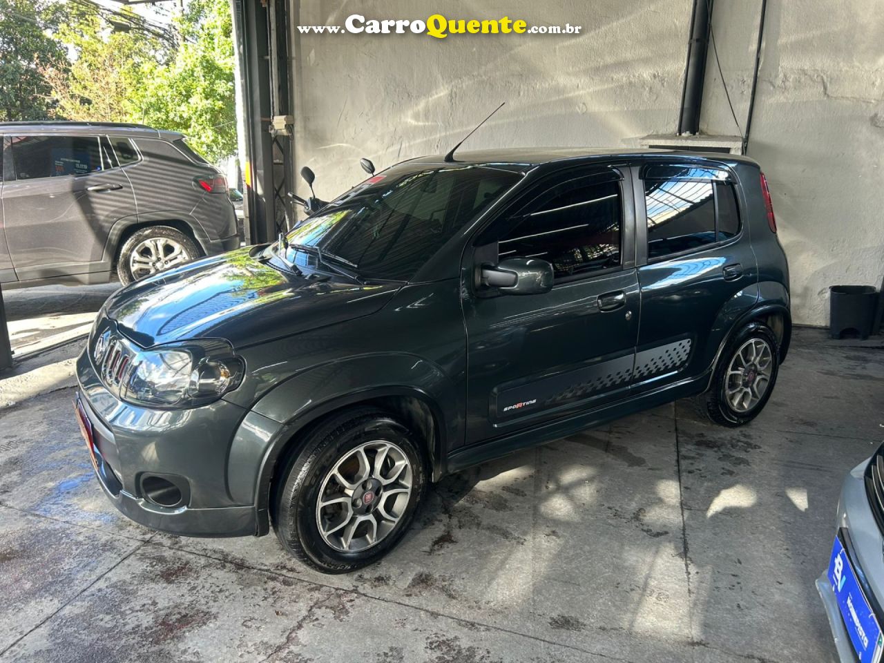 FIAT   UNO SPORTING 1.4 EVO FIRE FLEX 8V 4P   CINZA 2013 1.4 FLEX - Loja