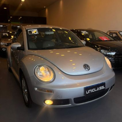 VOLKSWAGEN   NEW BEETLE 2.0 MI MEC.AUT.   PRATA 2010 2.0 GASOLINA