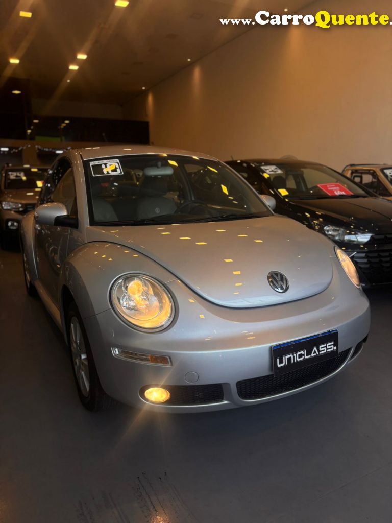 VOLKSWAGEN   NEW BEETLE 2.0 MI MEC.AUT.   PRATA 2010 2.0 GASOLINA - Loja