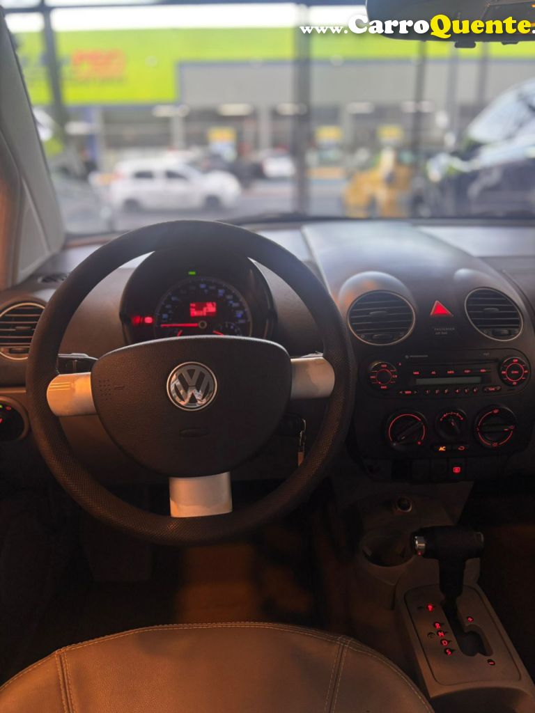 VOLKSWAGEN   NEW BEETLE 2.0 MI MEC.AUT.   PRATA 2010 2.0 GASOLINA - Loja