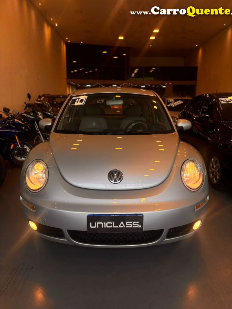 VOLKSWAGEN   NEW BEETLE 2.0 MI MEC.AUT.   PRATA 2010 2.0 GASOLINA - Loja