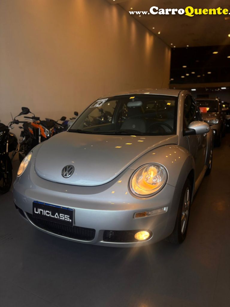 VOLKSWAGEN   NEW BEETLE 2.0 MI MEC.AUT.   PRATA 2010 2.0 GASOLINA - Loja