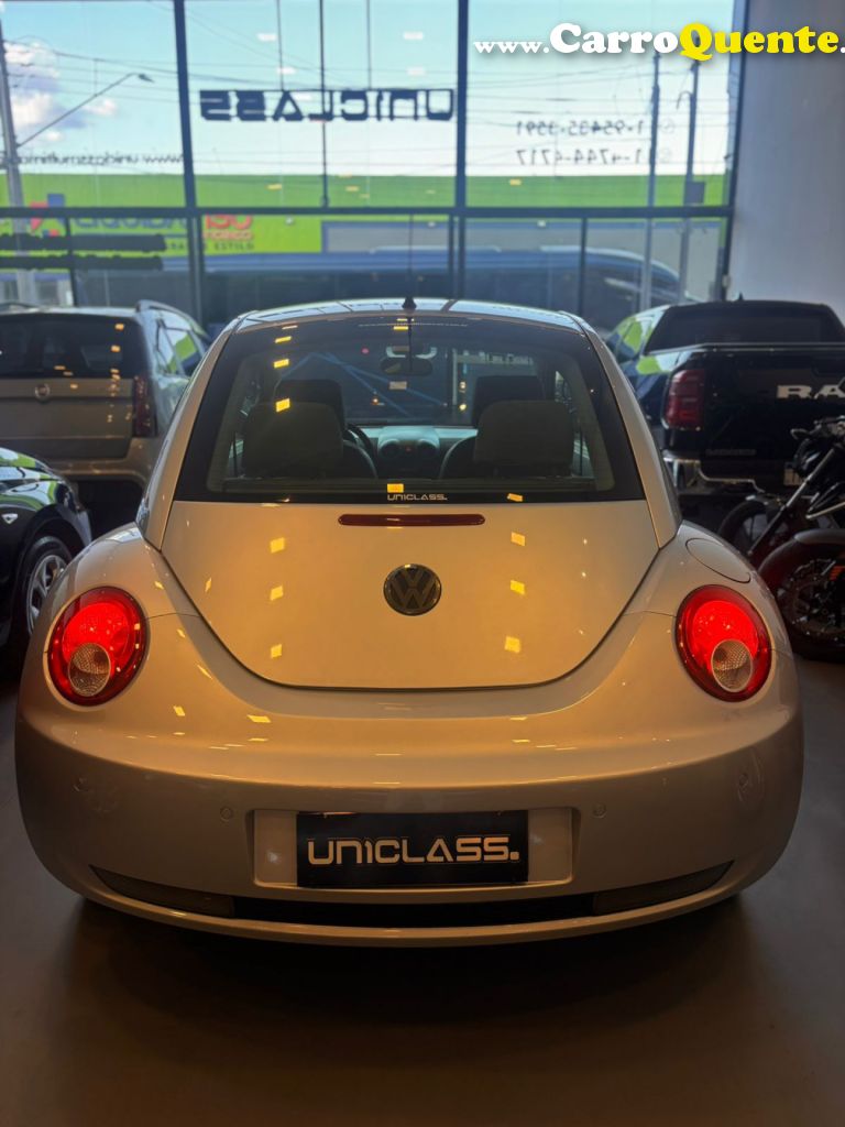 VOLKSWAGEN   NEW BEETLE 2.0 MI MEC.AUT.   PRATA 2010 2.0 GASOLINA - Loja