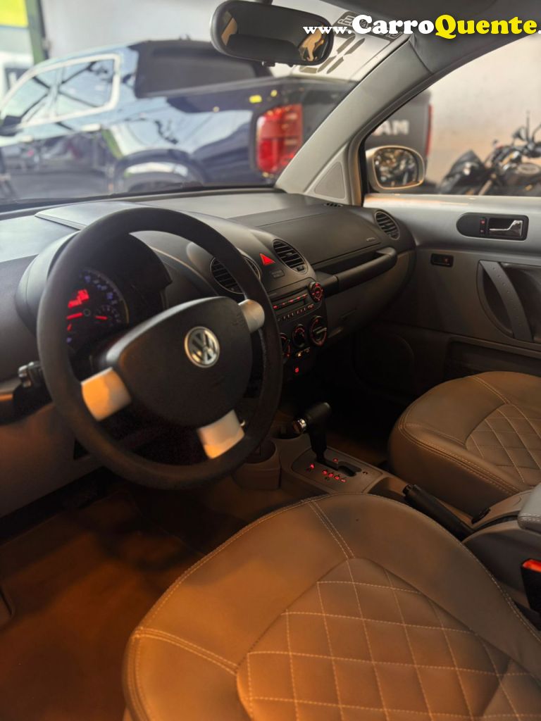 VOLKSWAGEN   NEW BEETLE 2.0 MI MEC.AUT.   PRATA 2010 2.0 GASOLINA - Loja