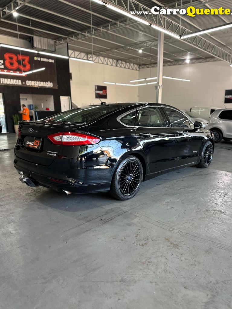 FORD   FUSION TITANIUM HYBRID 2.0 145CV AUT.   PRETO 2016 2.0 GASOLINA E ELÉTRICO - Loja