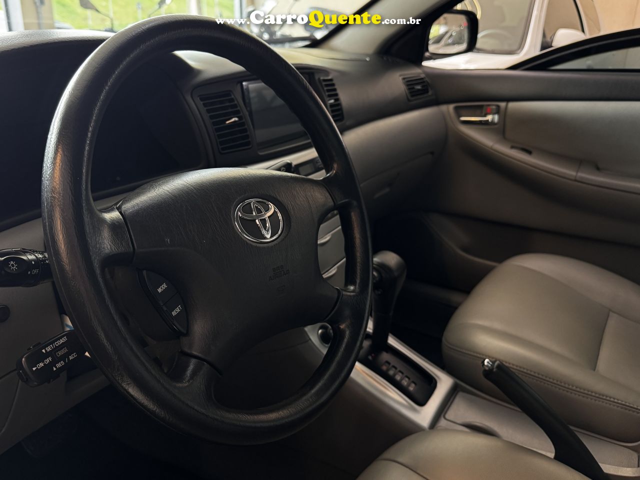 TOYOTA   COROLLA SE-G 1.81.8 FLEX 16V AUT.   PRETO 2006 1.8 GASOLINA - Loja
