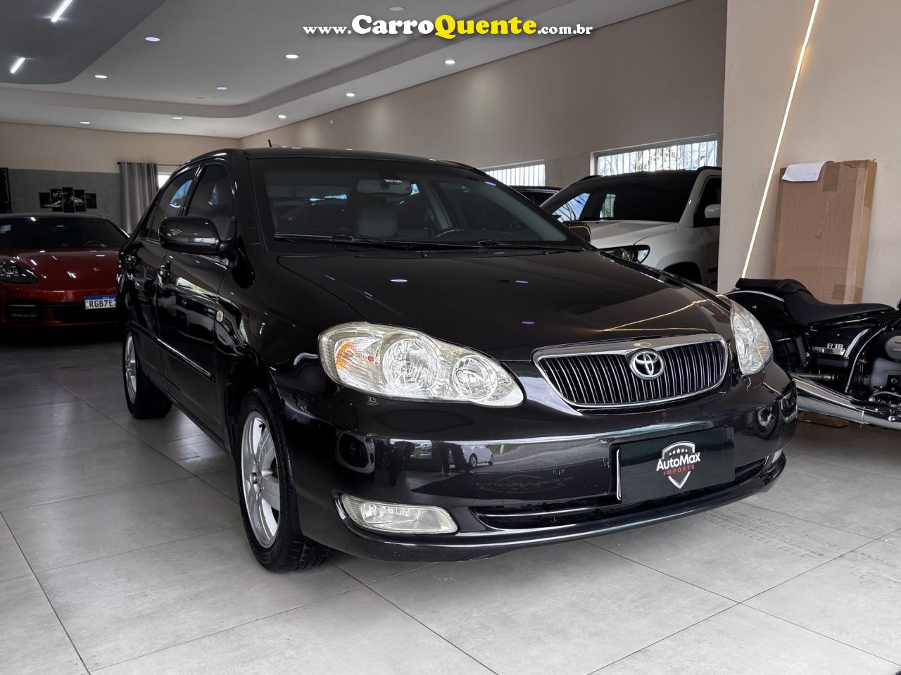 TOYOTA   COROLLA SE-G 1.81.8 FLEX 16V AUT.   PRETO 2006 1.8 GASOLINA - Loja