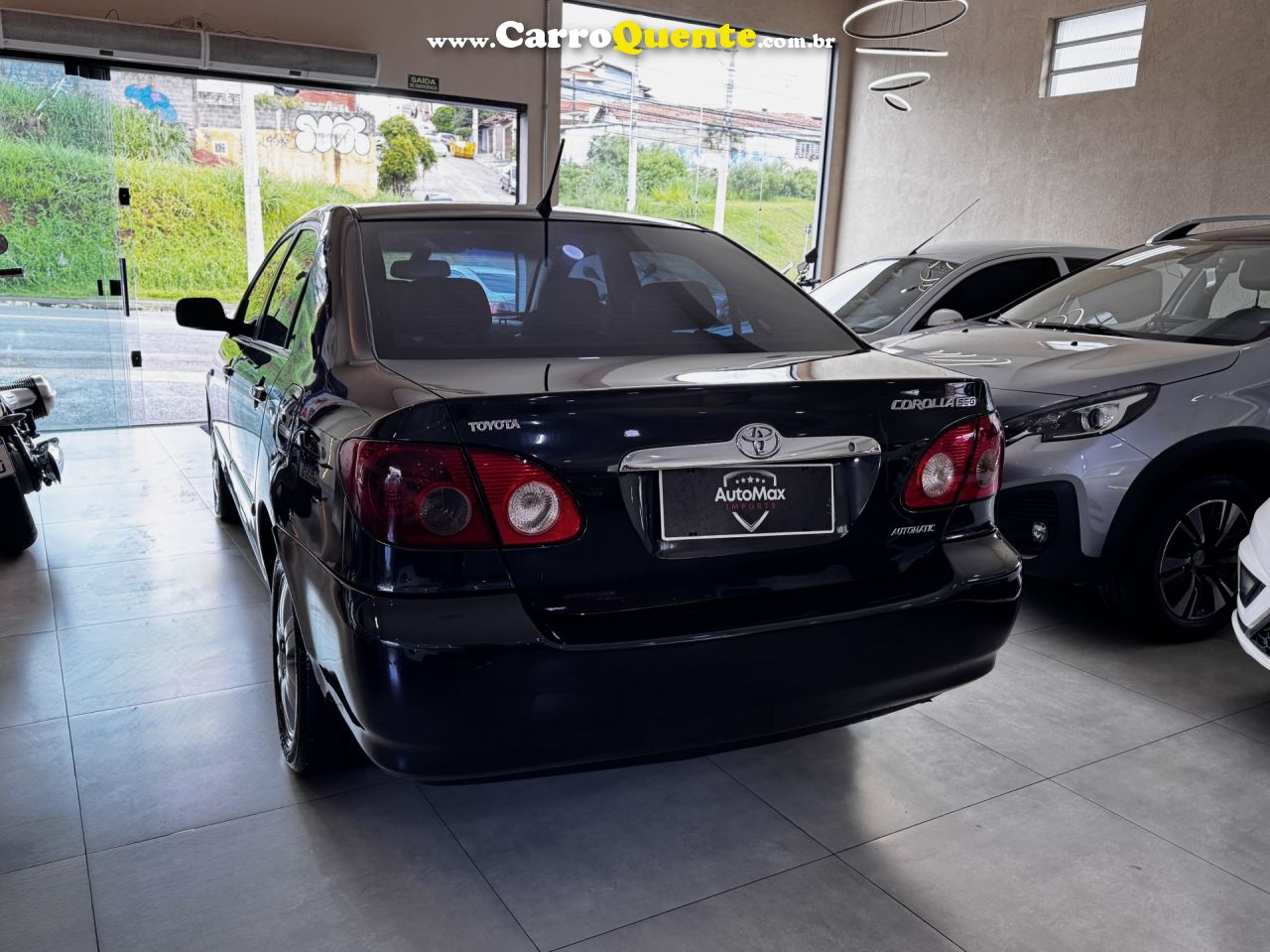 TOYOTA   COROLLA SE-G 1.81.8 FLEX 16V AUT.   PRETO 2006 1.8 GASOLINA - Loja