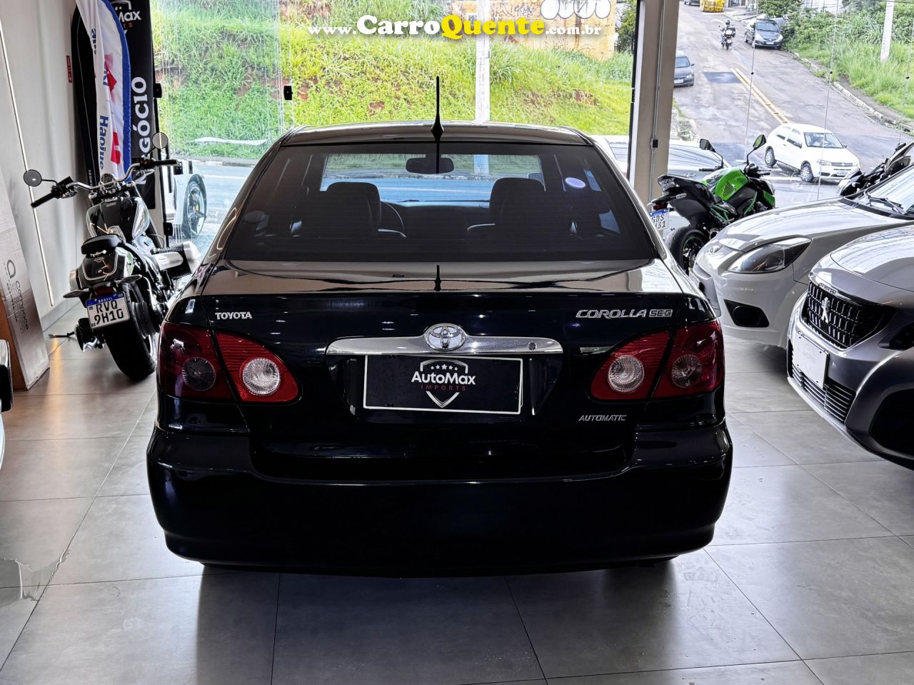 TOYOTA   COROLLA SE-G 1.81.8 FLEX 16V AUT.   PRETO 2006 1.8 GASOLINA - Loja