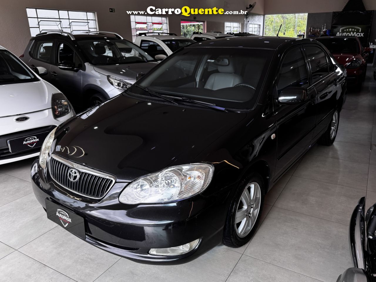 TOYOTA   COROLLA SE-G 1.81.8 FLEX 16V AUT.   PRETO 2006 1.8 GASOLINA - Loja