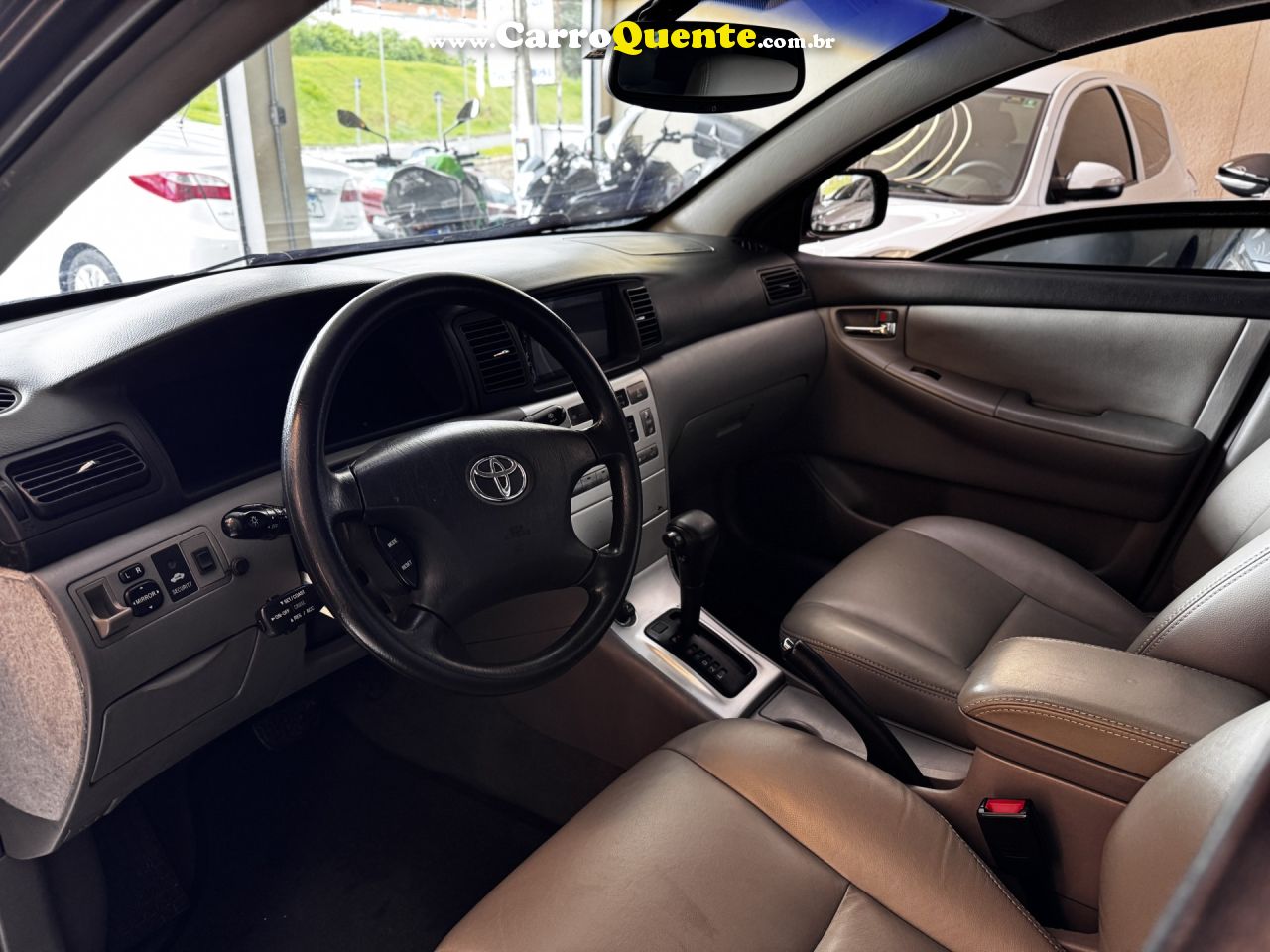 TOYOTA   COROLLA SE-G 1.81.8 FLEX 16V AUT.   PRETO 2006 1.8 GASOLINA - Loja