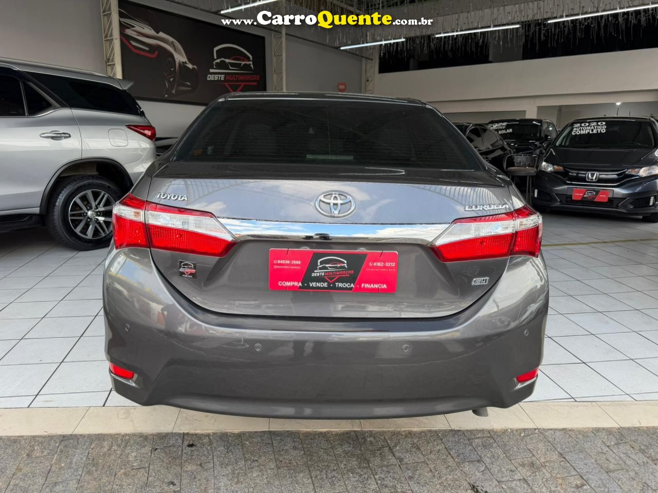 TOYOTA   COROLLA GLI 1.8 FLEX 16V  AUT.   CINZA 2015 1.8 FLEX - Loja