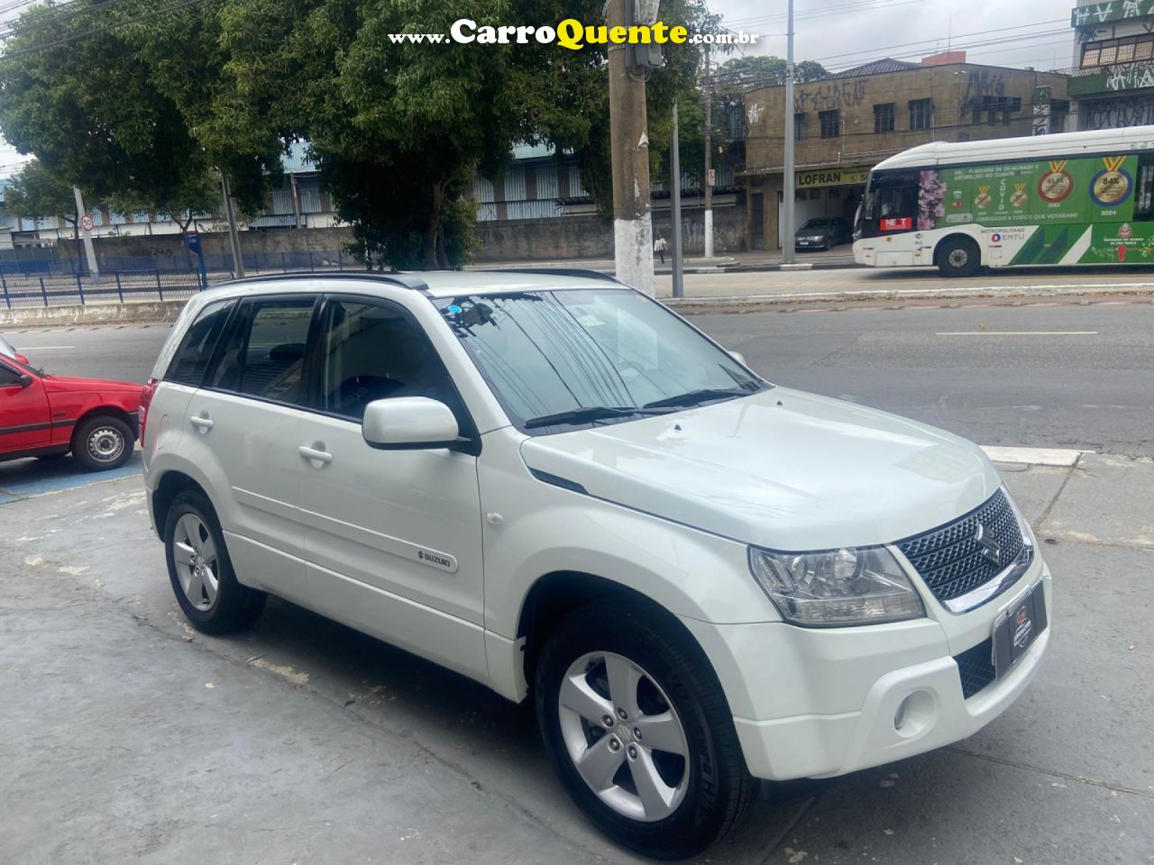 SUZUKI   GRAND VITARA 2.0 16V 4X24X4 5P AUT.   BRANCO 2012 2.0 GASOLINA - Loja