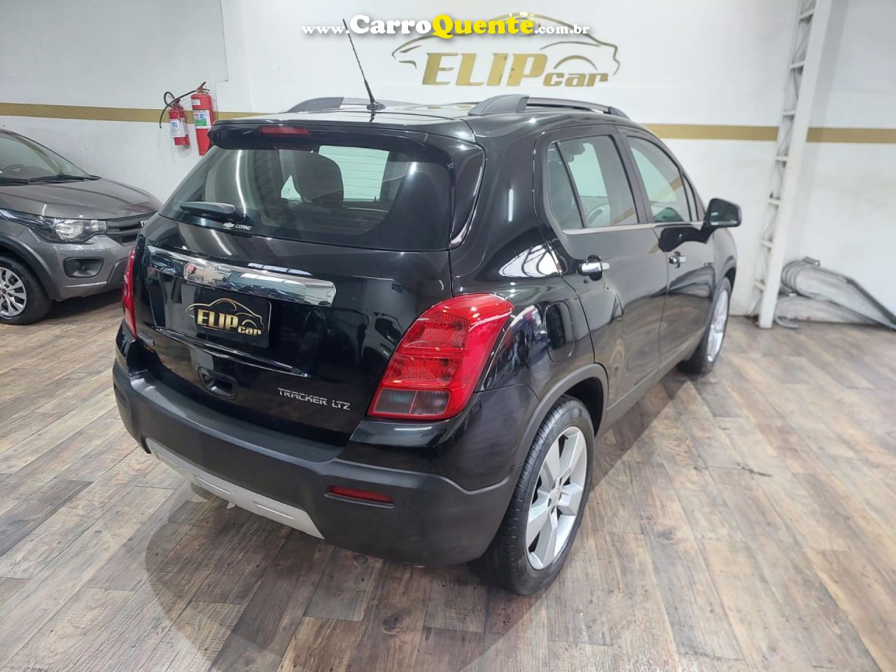 CHEVROLET   TRACKER LTZ 1.8 16V FLEX 4X2 AUT.   PRETO 2014 1.8 FLEX - Loja