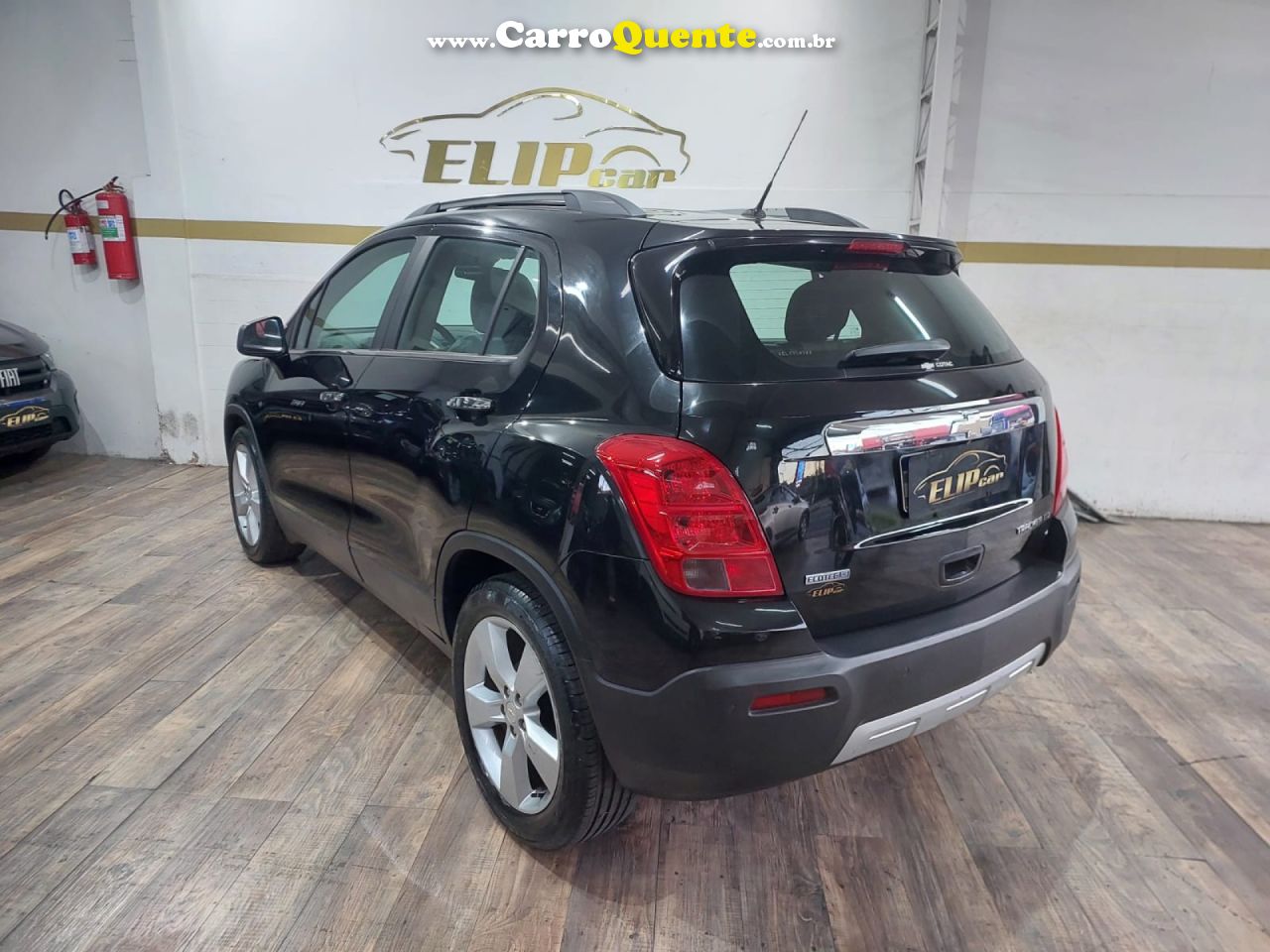 CHEVROLET   TRACKER LTZ 1.8 16V FLEX 4X2 AUT.   PRETO 2014 1.8 FLEX - Loja
