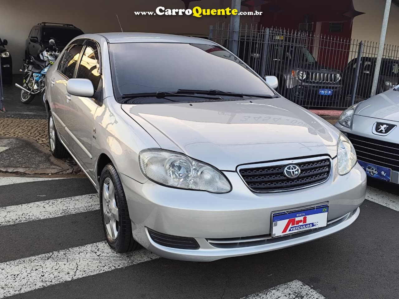 TOYOTA   COROLLA XEI 1.81.8 FLEX 16V AUT.   PRATA 2006 1.9 GASOLINA - Loja