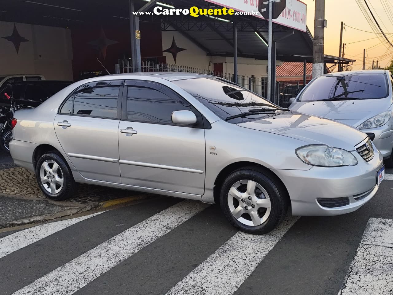 TOYOTA   COROLLA XEI 1.81.8 FLEX 16V AUT.   PRATA 2006 1.9 GASOLINA - Loja