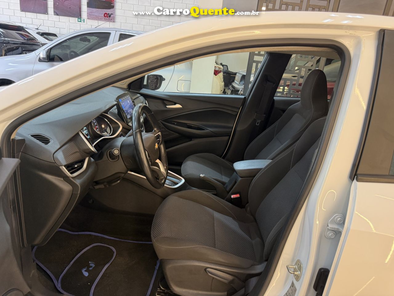 CHEVROLET   ONIX SEDAN PLUS LTZ 1.0 12V TB FLEX AUT.   BRANCO 2024 1.0 FLEX - Loja