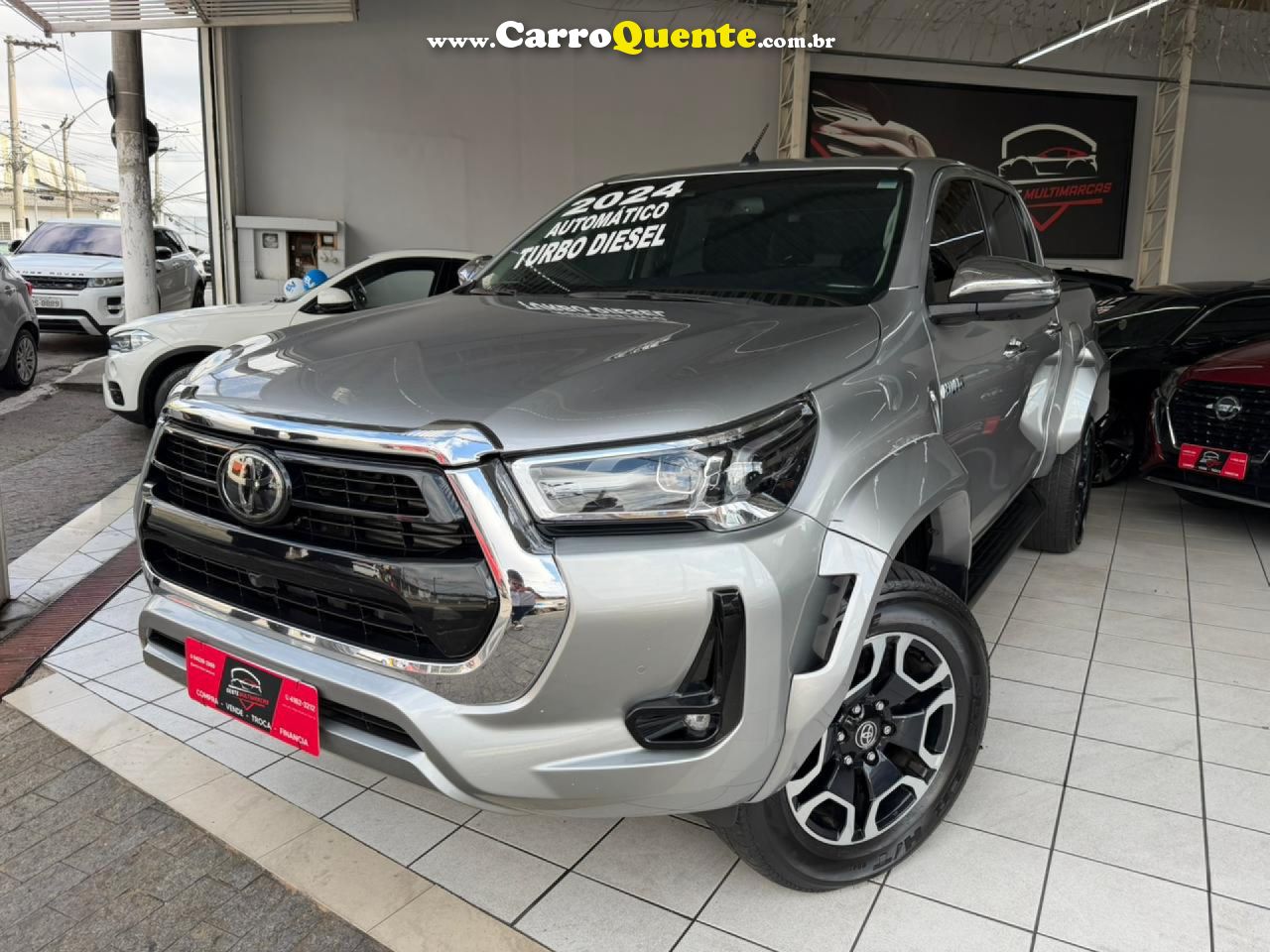 TOYOTA   HILUX CD SRX 4X4 2.8 TDI 16V DIESEL AUT.   PRATA 2024 2.8 DIESEL - Loja