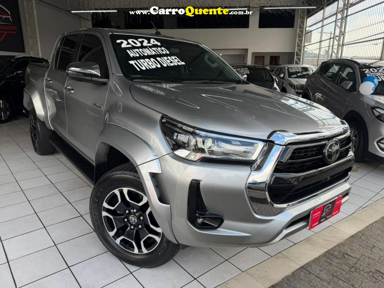 TOYOTA   HILUX CD SRX 4X4 2.8 TDI 16V DIESEL AUT.   PRATA 2024 2.8 DIESEL - Loja